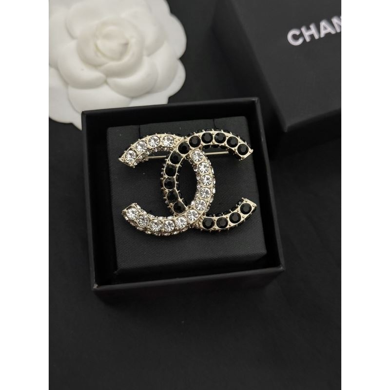 Ch*el brooches